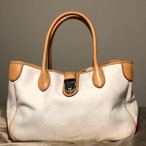 Dooney & Bourke Handbags - Dooney & Bourque logo satchel handbag. Off-white cloth and tan leather.